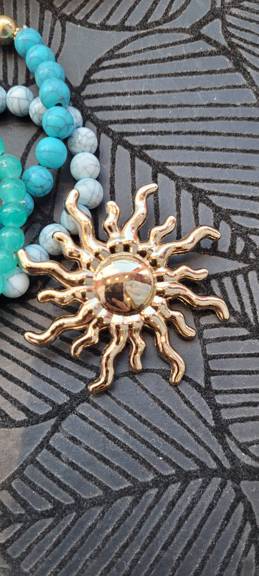 Broche Soleil